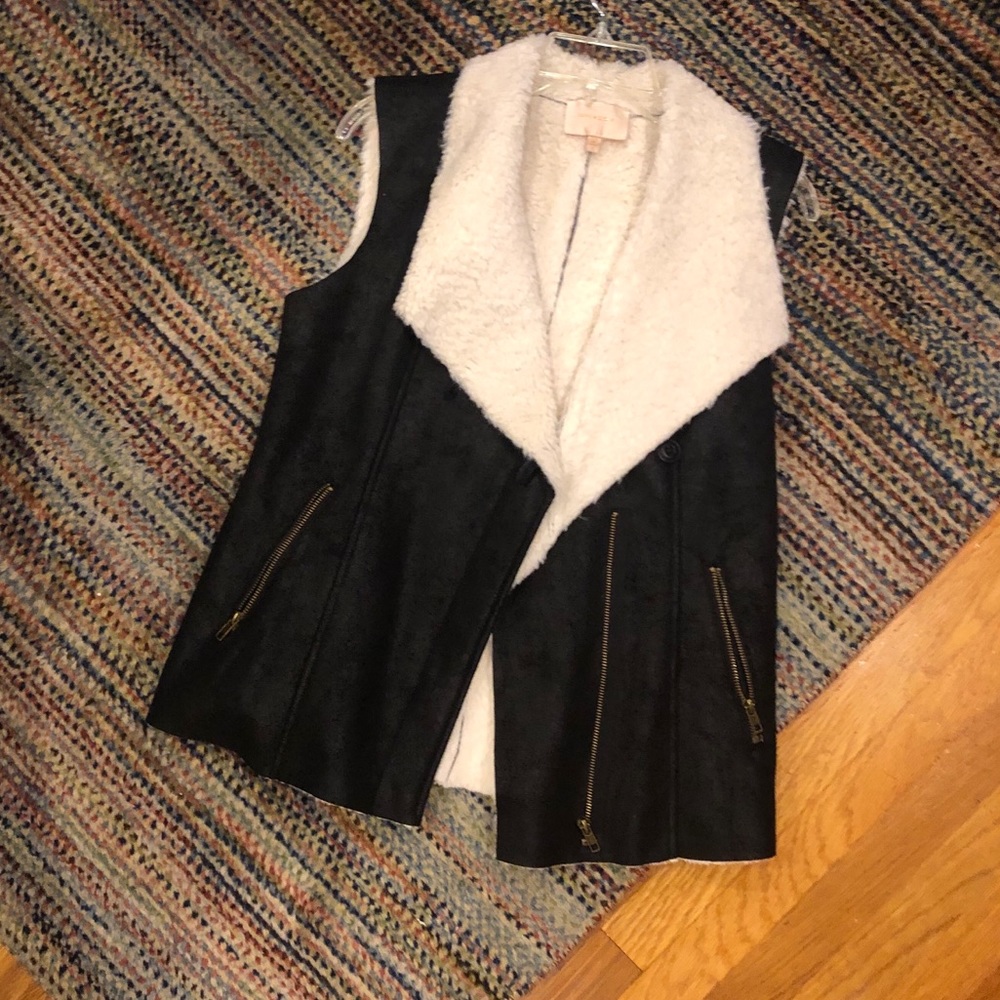 Skies are blue faux fur vest